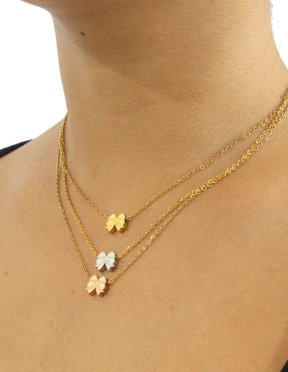 Collar y Aretes NUVI 3 Cadenas Moños Tricolor